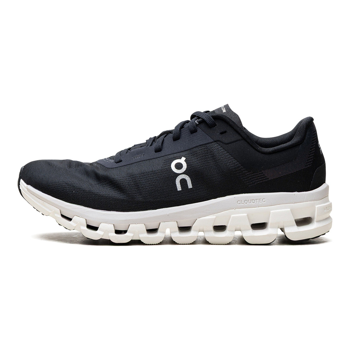 ON Cloudflow 4 Sneaker in Black White | Women