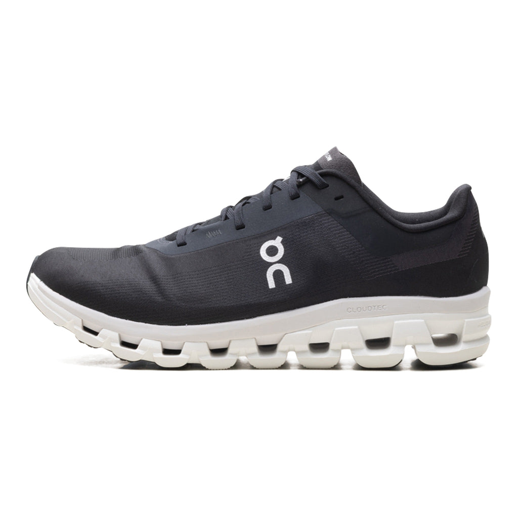ON Cloudflow 4 Sneaker in Black White | Men